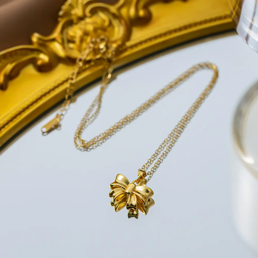 Golden Ribbon Charm Pendant